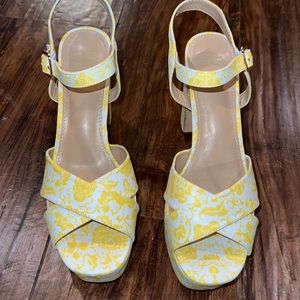 White and yellow floral chunky sandal heels.